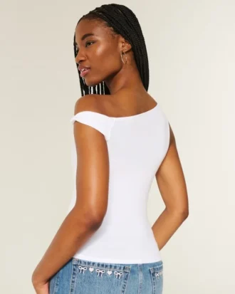 Asymmetrisk axelbar topp