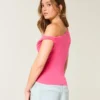 Asymmetrisk axelbar topp