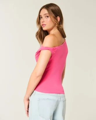 Asymmetrisk axelbar topp