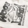 Avslappnad T-shirt med blandad grafik Avslappnad T-shirt med blandad grafik
