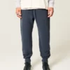 Avslappnade joggingbyxor med ribbade ben Avslappnade joggingbyxor med ribbade ben