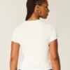 Baby-T-shirt med fjärilsmotiv Baby-T-shirt med fjärilsmotiv