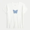 Baby-T-shirt med fjärilsmotiv Baby-T-shirt med fjärilsmotiv