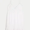 Babydoll-miniklänning med repkant Babydoll-miniklänning med repkant