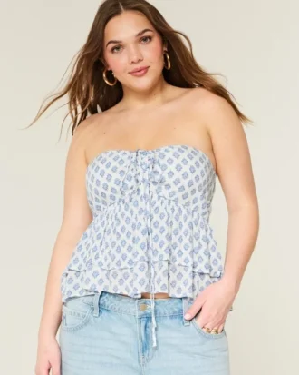 Babydoll-top med halterneck och volanger