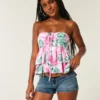 Babydoll-top med halterneck och volanger Babydoll-top med halterneck och volanger