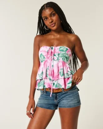 Babydoll-top med halterneck och volanger