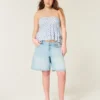 Babydoll-top med halterneck och volanger Babydoll-top med halterneck och volanger