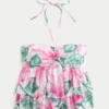 Babydoll-top med halterneck och volanger Babydoll-top med halterneck och volanger