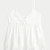 Babydoll-top med knytning fram Babydoll-top med knytning fram