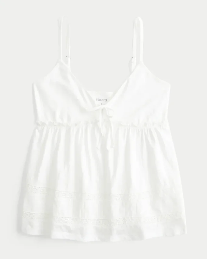 Babydoll-top med knytning fram Babydoll-top med knytning fram
