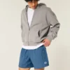 Baggy fotbollsshorts i midjehöjd
