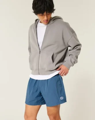 Baggy fotbollsshorts i midjehöjd