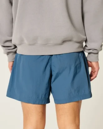 Baggy fotbollsshorts i midjehöjd