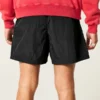 Baggy fotbollsshorts i midjehöjd