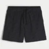 Baggy fotbollsshorts i midjehöjd