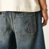 Baggy jeansshorts med ormmotiv Baggy jeansshorts med ormmotiv