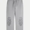 Baggy sweatpants med dubbla ormgrafik