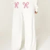 Baggy sweatpants med polkagris-motiv Baggy sweatpants med polkagris-motiv