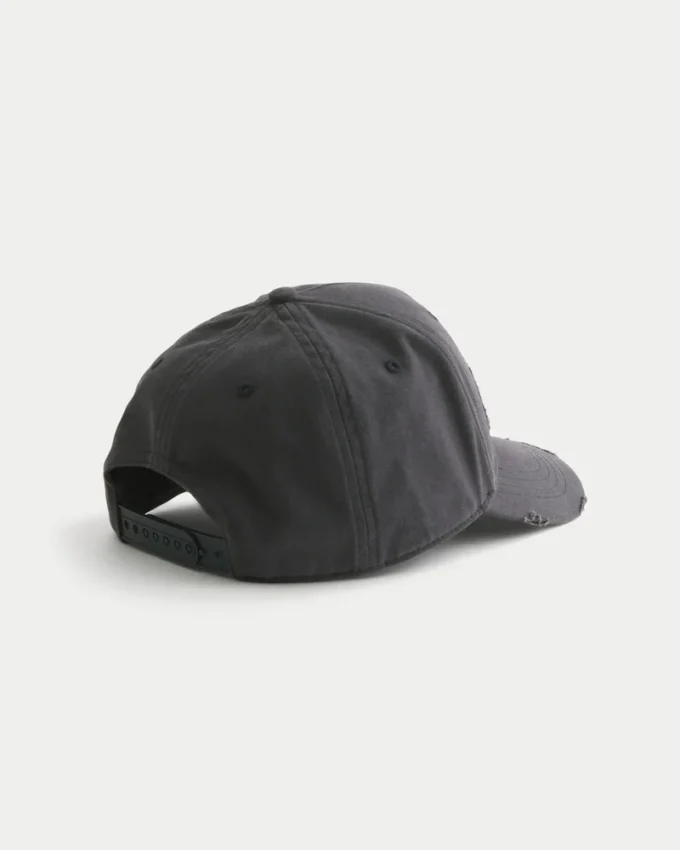 Baseballkeps med slitna applikationer