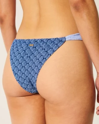 Bikinitrosa med höga ben och sidoremmar