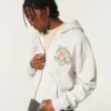 Boxig hoodie med dragkedja och tryck från University of Miami Hurricanes Boxig hoodie med dragkedja och tryck från University of Miami Hurricanes