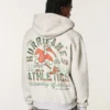 Boxig hoodie med dragkedja och tryck från University of Miami Hurricanes Boxig hoodie med dragkedja och tryck från University of Miami Hurricanes