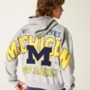 Boxig hoodie med dragkedja och tryck från University of Michigan Wolverines Boxig hoodie med dragkedja och tryck från University of Michigan Wolverines