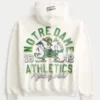 Boxig hoodie med dragkedja och tryck från University of Notre Dame Fighting Irish Boxig hoodie med dragkedja och tryck från University of Notre Dame Fighting Irish