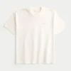 Boxig, tung T-shirt med mikro-logo och rund halsringning