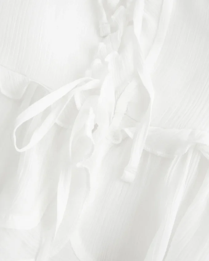Chiffong-camisole med volanger Chiffong-camisole med volanger