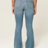 Curvy hög midja medium tvättade flare jeans Curvy hög midja medium tvättade flare jeans