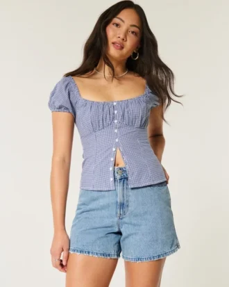 Curvy högmidjade, medellavtvättade, avslappnade jeansshorts 5″