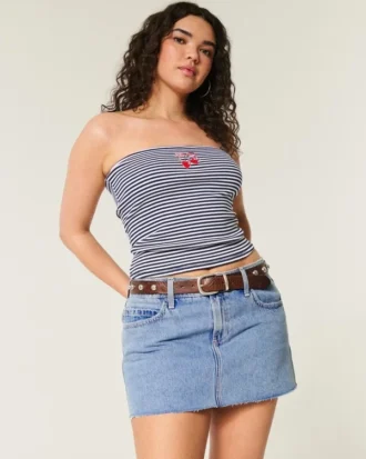 Curvy lågmidjad miniskort i mediumtvättad denim