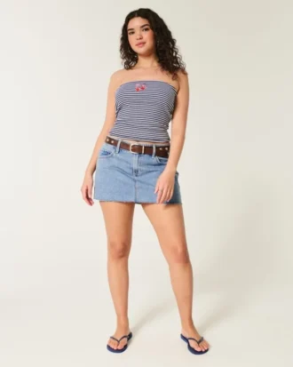 Curvy lågmidjad miniskort i mediumtvättad denim