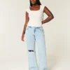 Curvy lågmidjade, slitna, ljusblå baggy jeans Curvy lågmidjade, slitna, ljusblå baggy jeans