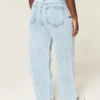 Curvy lågmidjade, slitna, ljusblå baggy jeans Curvy lågmidjade, slitna, ljusblå baggy jeans