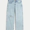 Curvy lågmidjade, slitna, ljusblå baggy jeans Curvy lågmidjade, slitna, ljusblå baggy jeans