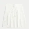 Enkel, axelbandslös babydoll-top i virkad stil Enkel, axelbandslös babydoll-top i virkad stil