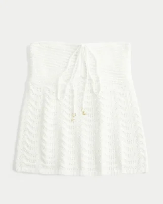 Enkel, axelbandslös babydoll-top i virkad stil