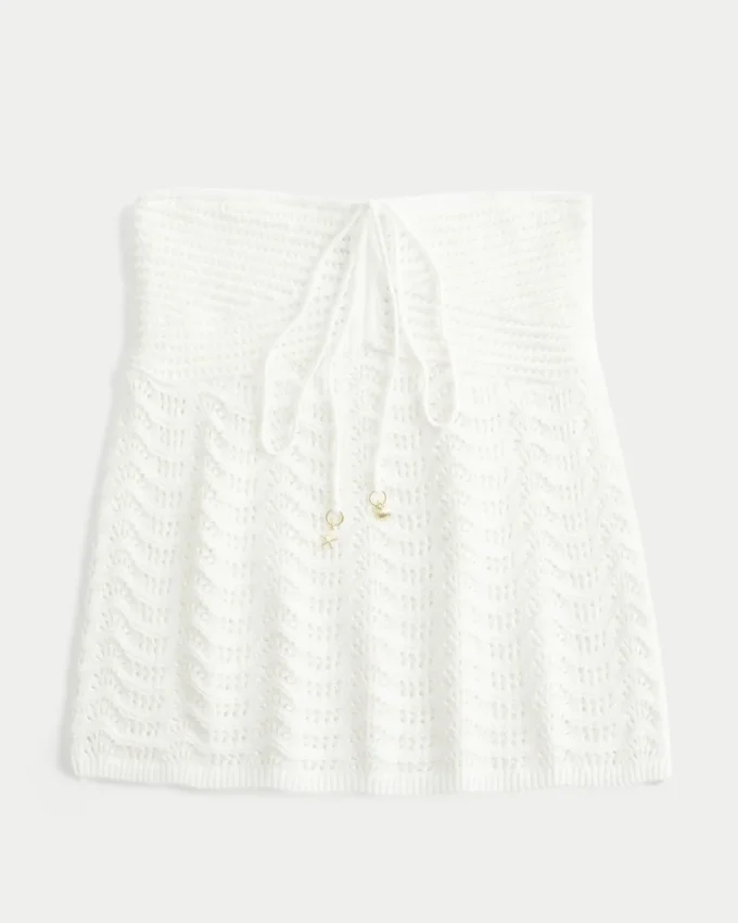 Enkel, axelbandslös babydoll-top i virkad stil Enkel, axelbandslös babydoll-top i virkad stil
