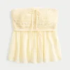 Enkel axelbandslös babydoll-top i virkat mixmaterial Enkel axelbandslös babydoll-top i virkat mixmaterial
