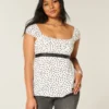 Enkel babydoll-top i satin med knytband Enkel babydoll-top i satin med knytband