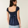 Enkel babydoll-top i satin med knytband Enkel babydoll-top i satin med knytband