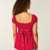 Enkel babydoll-top i satin med knytband Enkel babydoll-top i satin med knytband