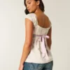 Enkel babydoll-top i satin med knytband Enkel babydoll-top i satin med knytband