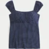 Enkel babydoll-top i satin med knytband Enkel babydoll-top i satin med knytband