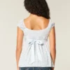 Enkel babydoll-top i satin med knytband Enkel babydoll-top i satin med knytband