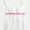 Enkel babydoll-top i satin med knytband Enkel babydoll-top i satin med knytband