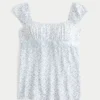 Enkel babydoll-top i satin med knytband Enkel babydoll-top i satin med knytband